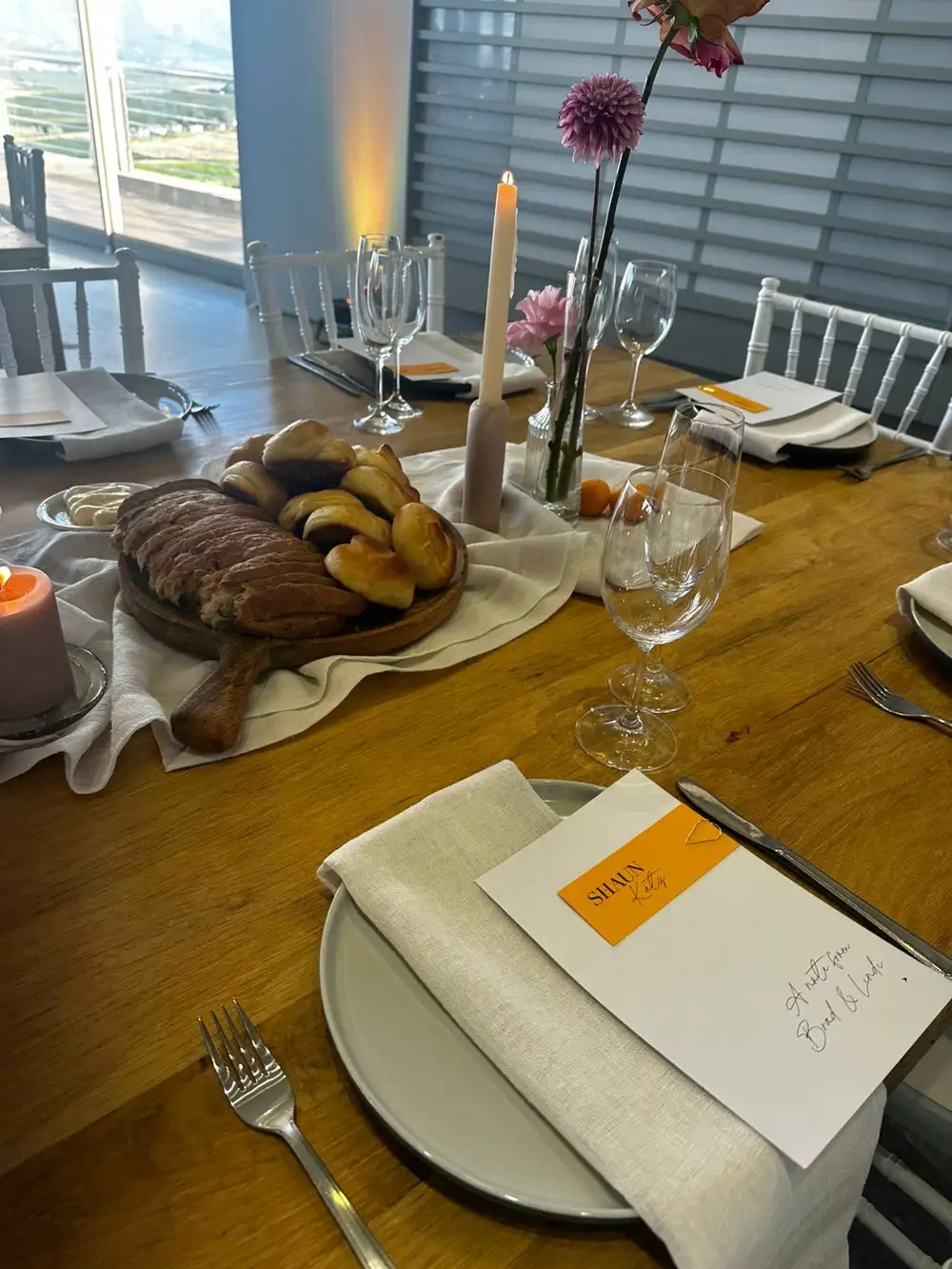 Place card with a hand-written note on a linen napkin